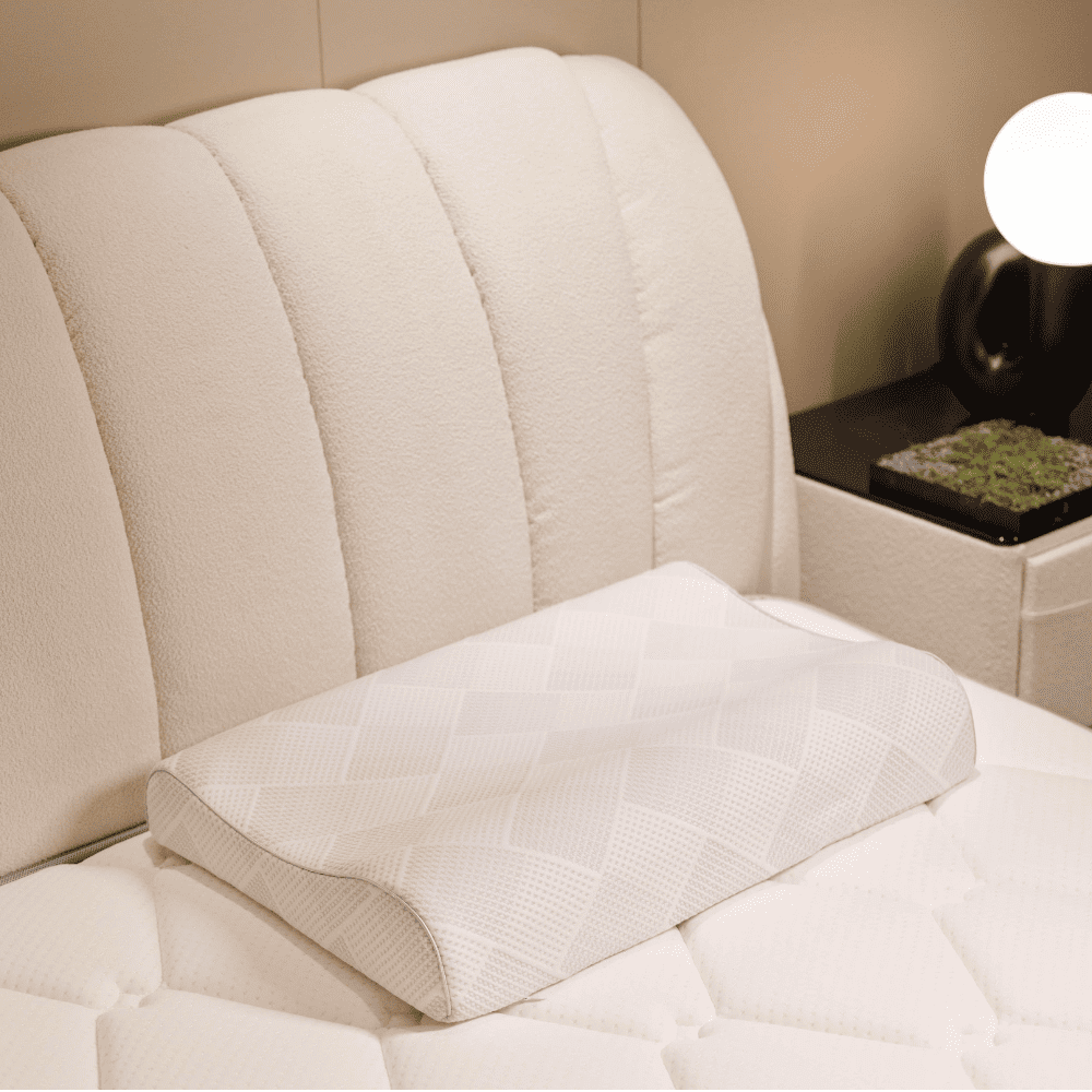 The certified non-toxic DeRUCCI Natural Latex Pillow with a washable, easy-to-clean design to maintain a hygienic, allergen-free master bedroom sleep environment.